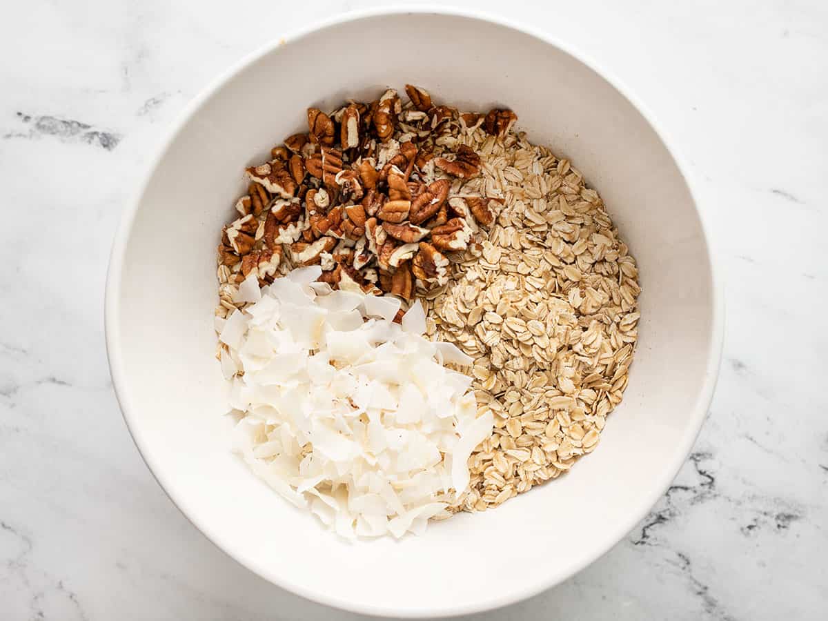 Granola dry ingredients in a bowl.