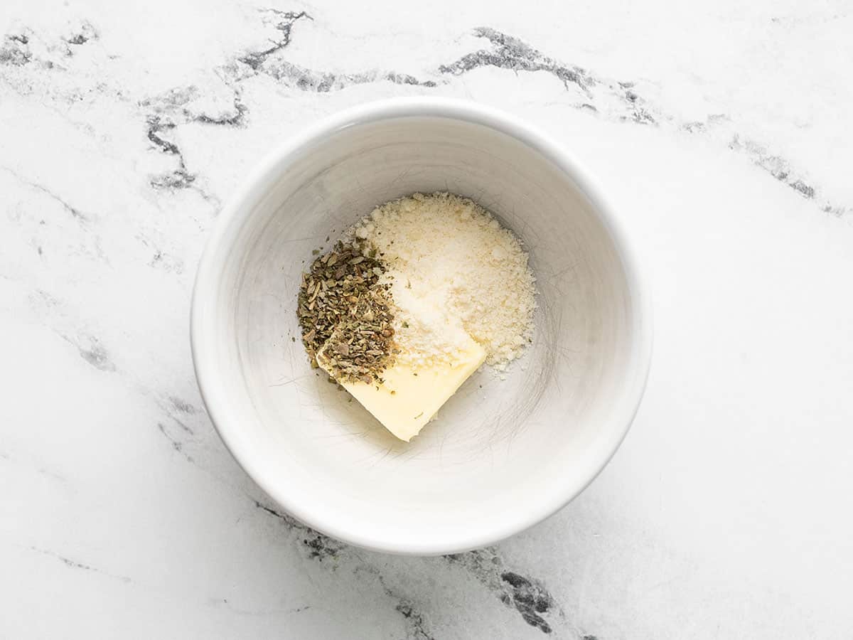 Parmesan butter mix in ramekin.