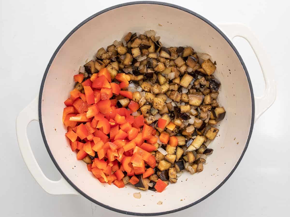 Diced bell pepper added to the pot.