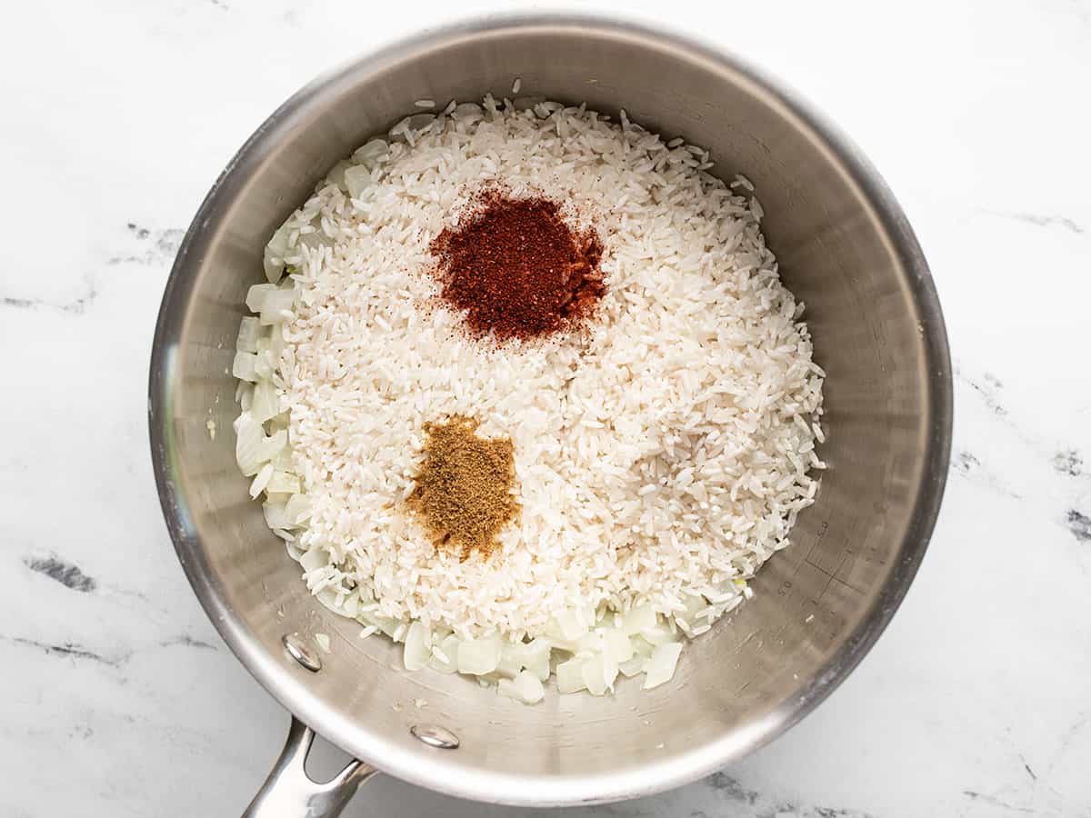 Rice and spices added to the pot.