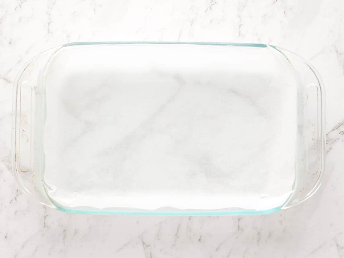 Baking dish lined with parchment paper.