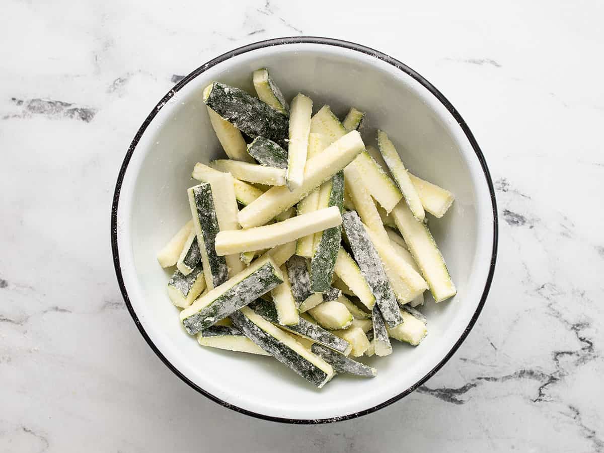 Zucchini dusted with flour.