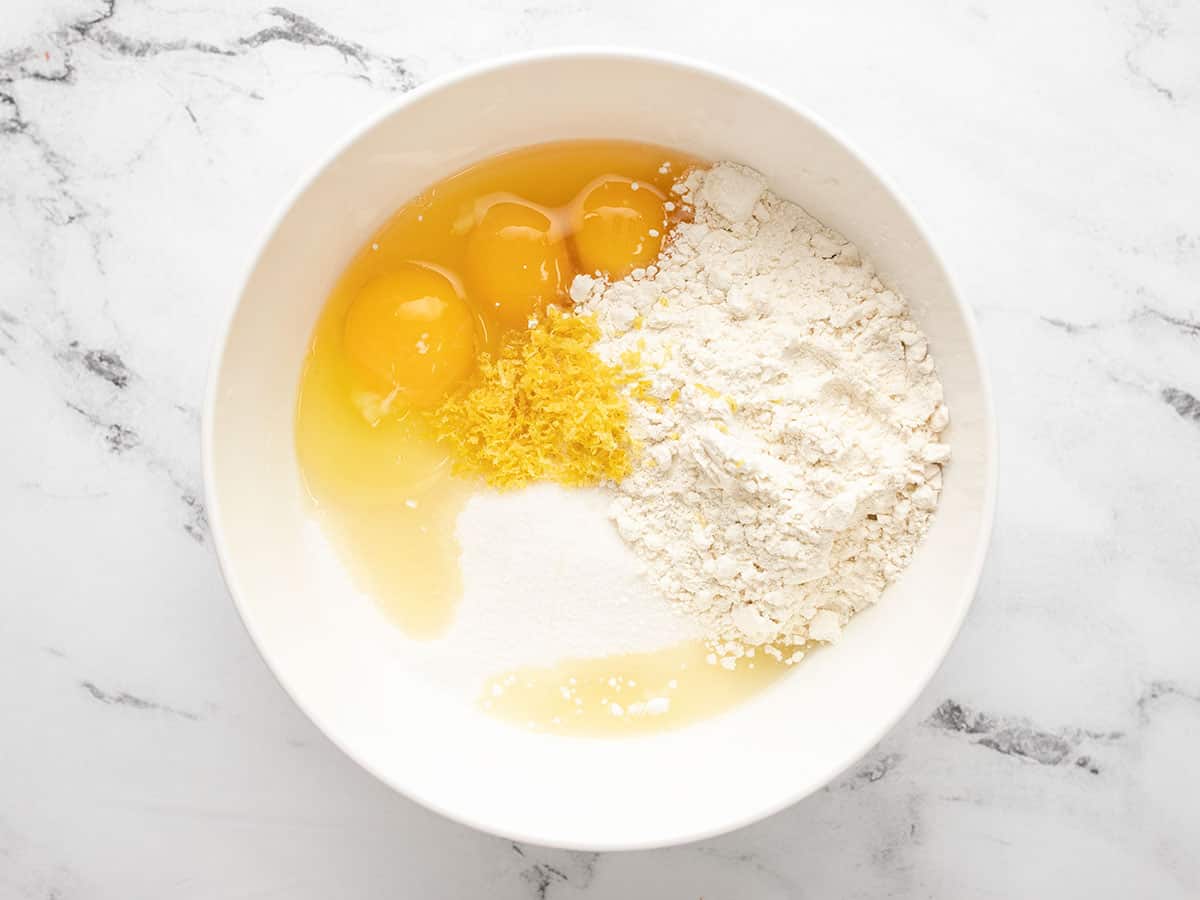 Custard ingredients, minus juice, in a bowl.