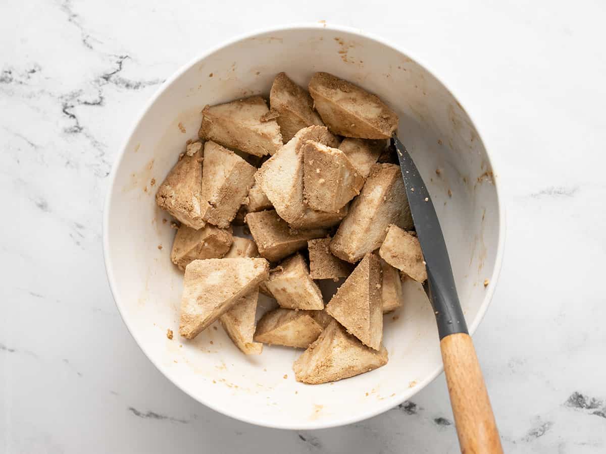 Tofu coated in seasoned cornstarch and oil. 