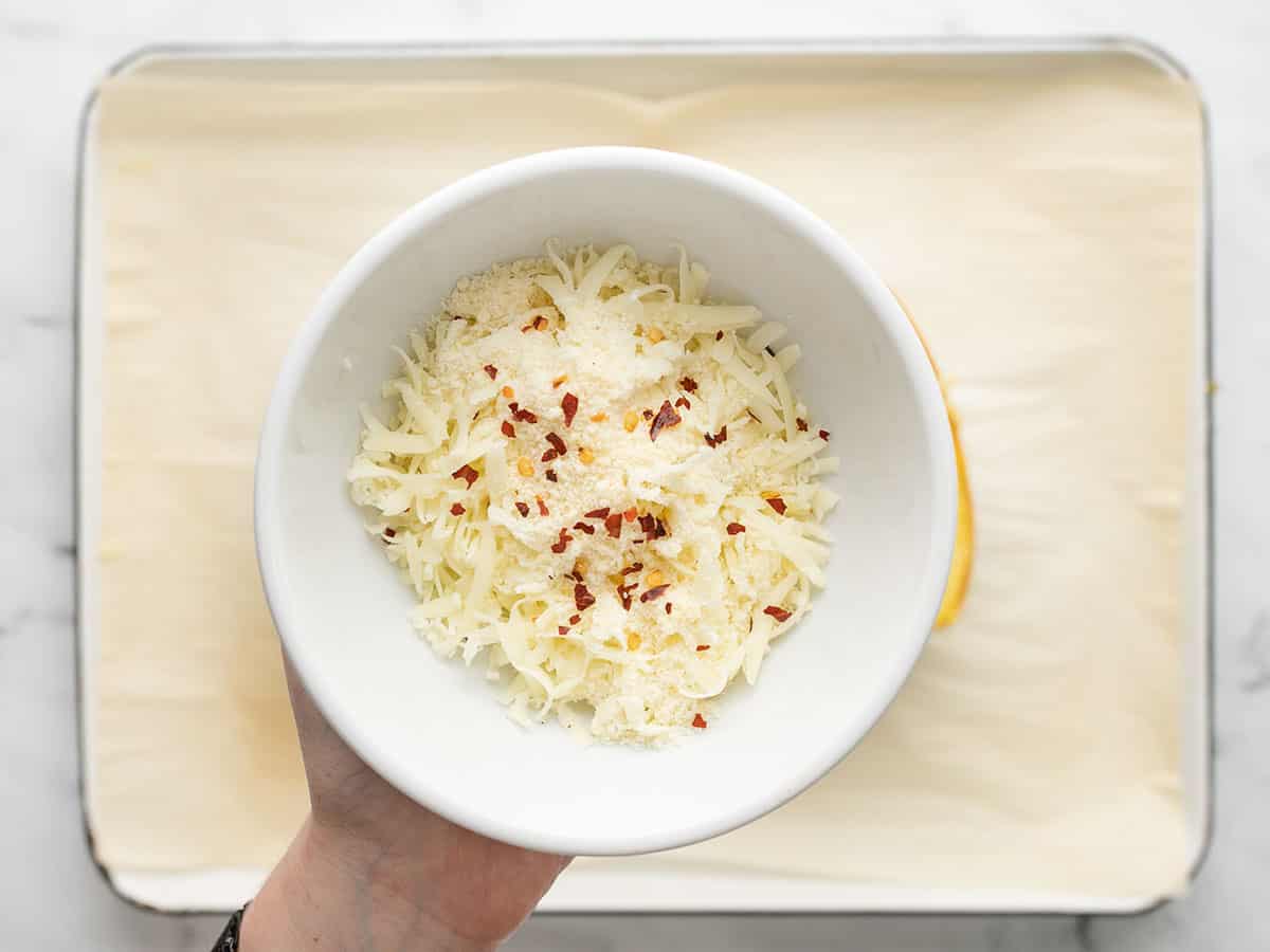 Overhead shot of cheese mix in a bowl.