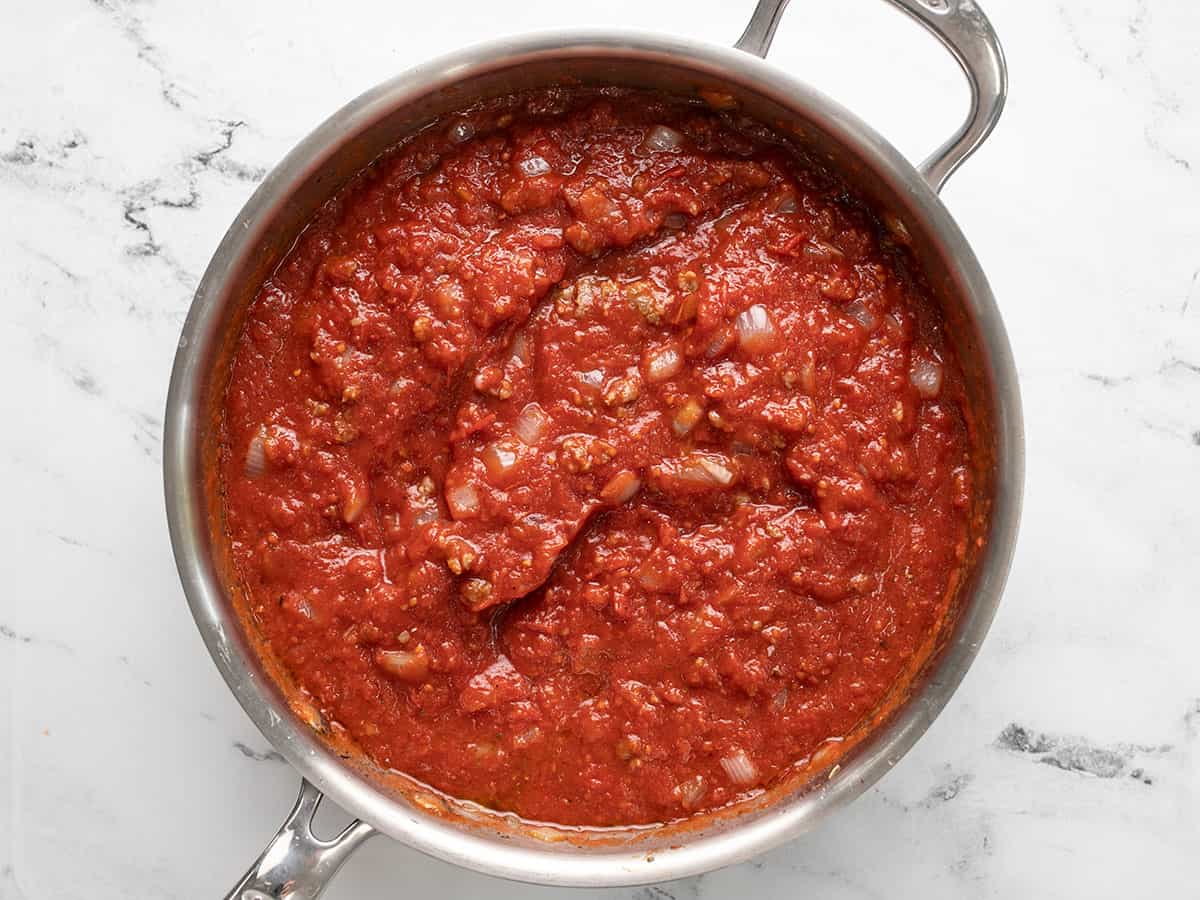 Stirred sauce in the skillet.