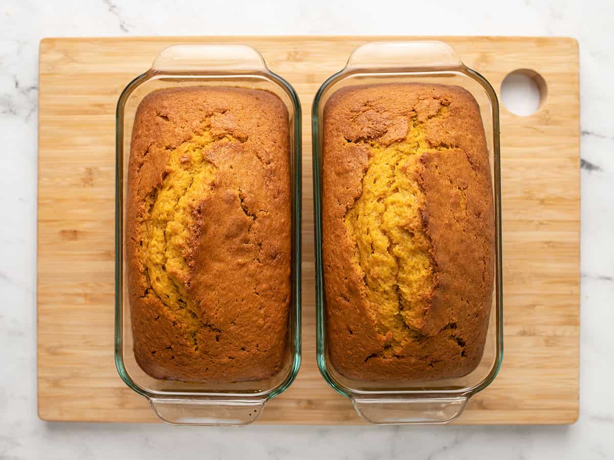 Overhead shot of two loaves of finished pumpkin bread.