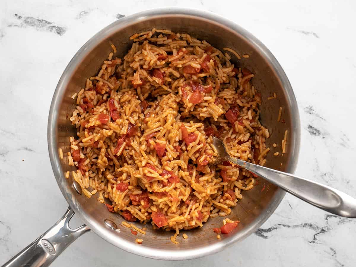 Fluffed Spanish rice in the pot.