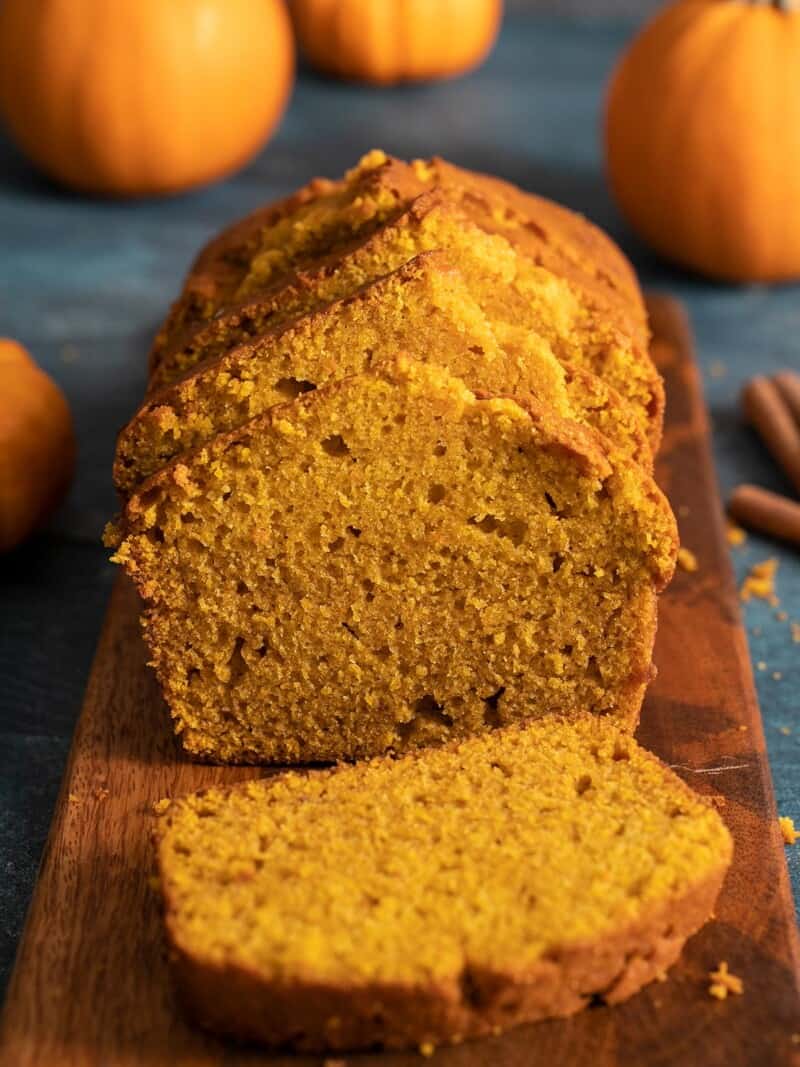 Side shot of sliced pumpkin bread.