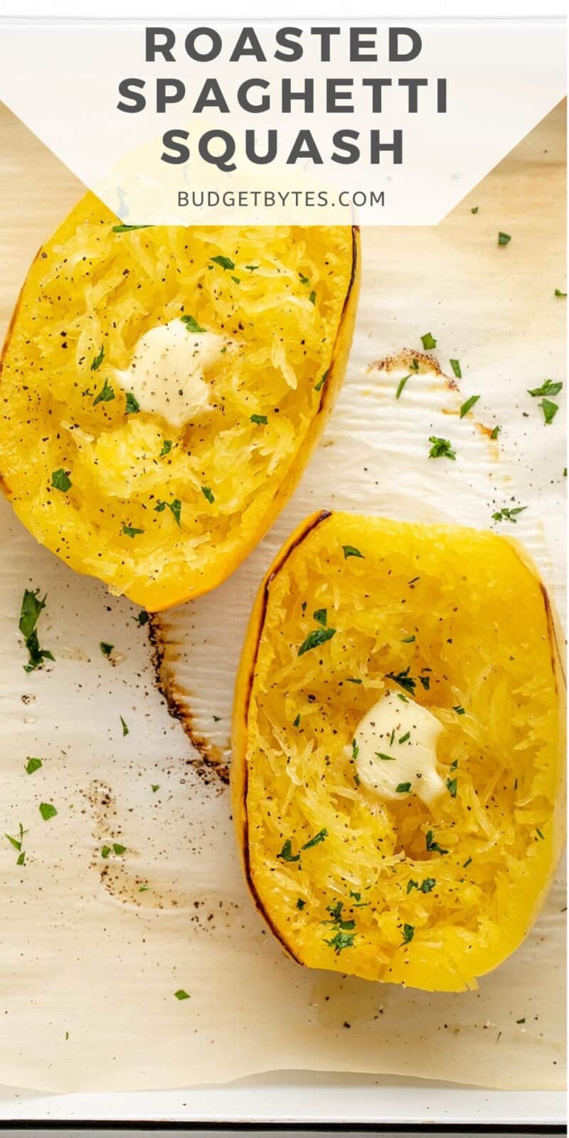 Overhead shot of roasted spaghetti squash dressed with butter and chopped Italian parsley.