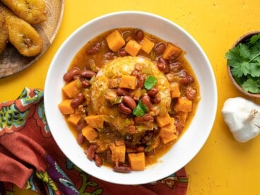 Overhead shot of a white bowl of red beans and rice.