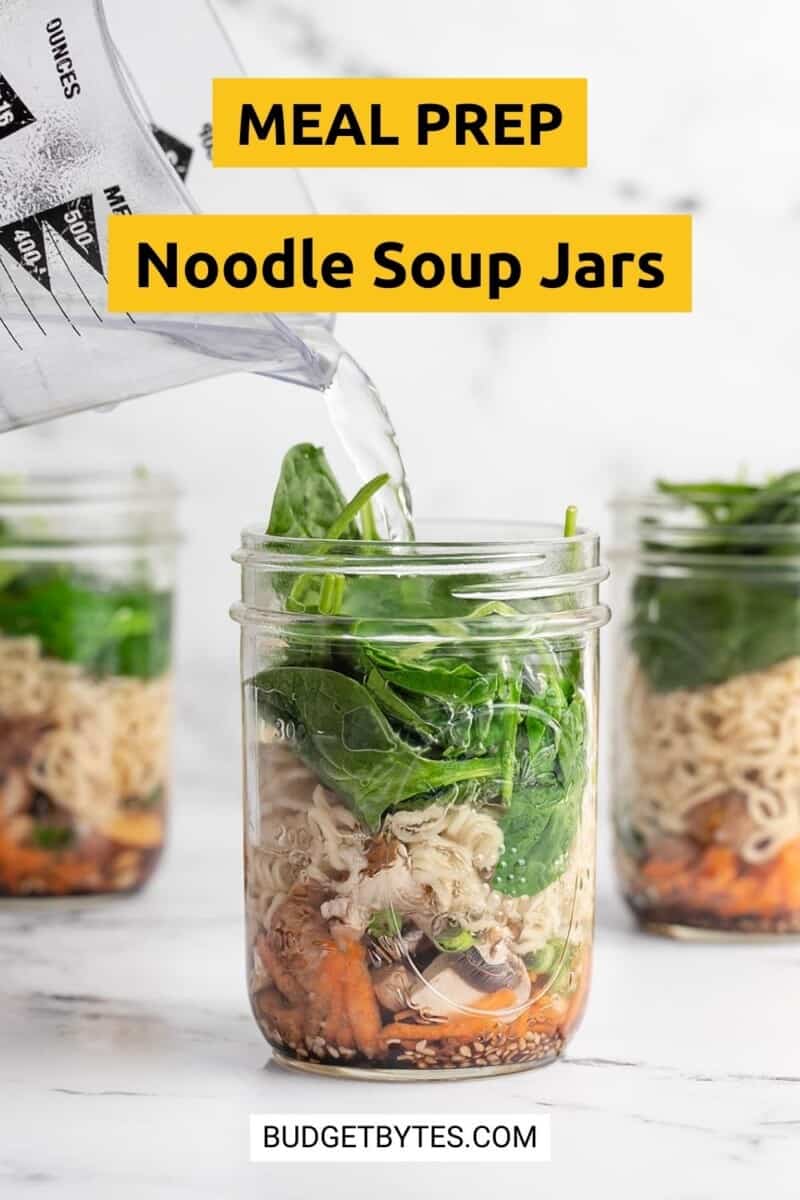 Water being poured into a noodle soup jar.