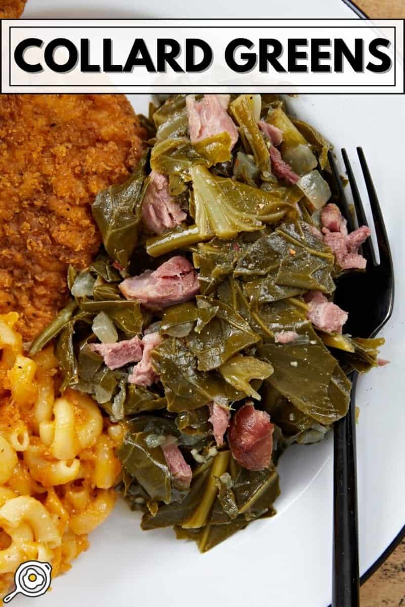 Collard greens with ham on a plate with chicken and mac and cheese.