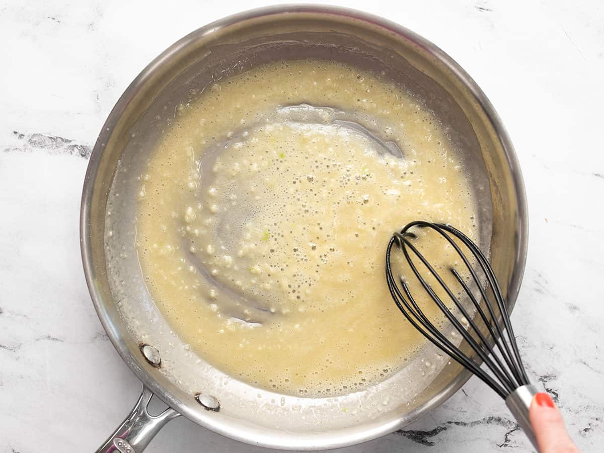 Butter and flour roux being cooked in the skillet.