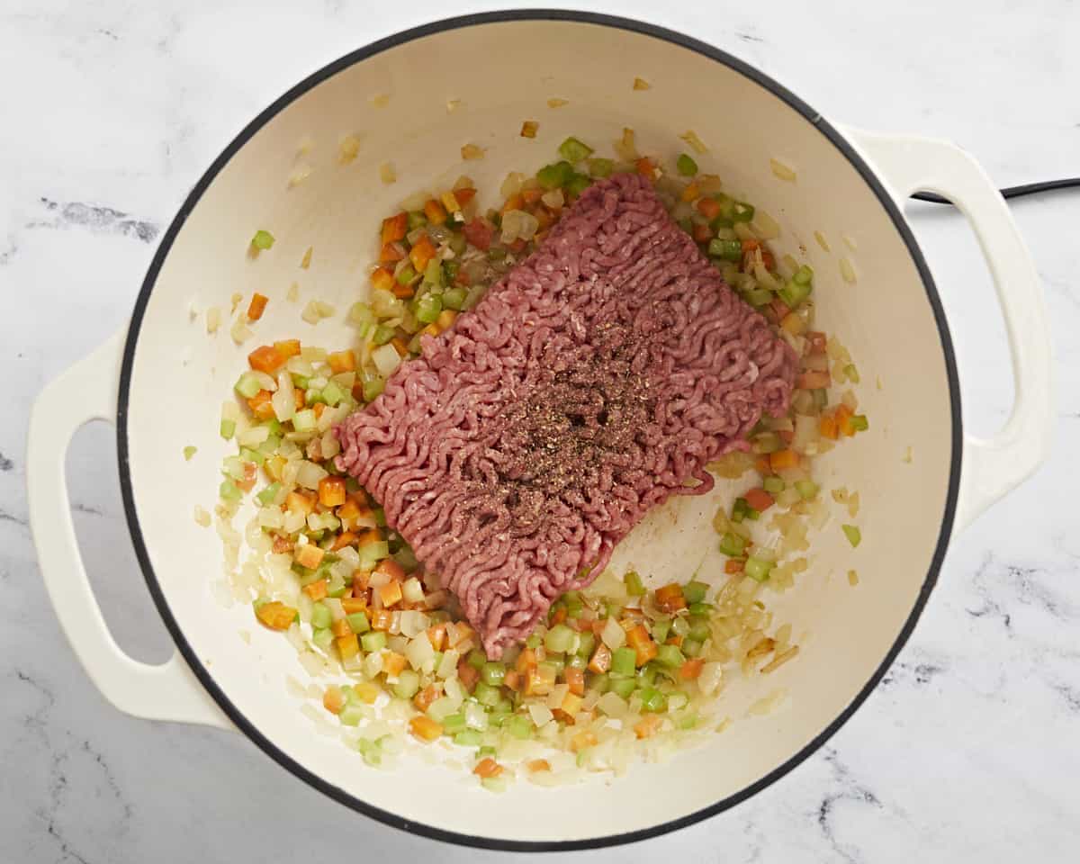 Overhead shot of sauteed veg with ground beef in it.