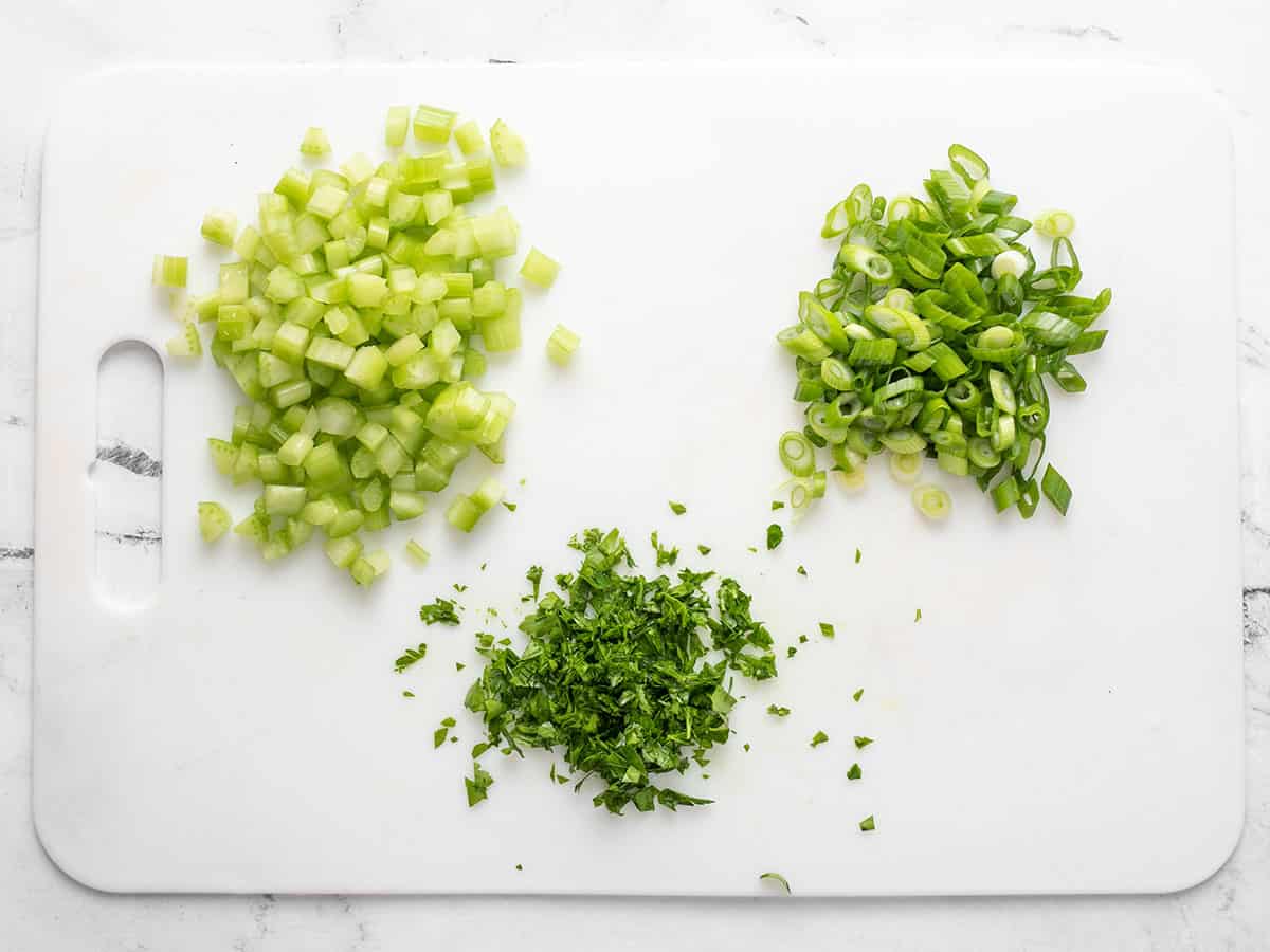 Chopped vegetables on a cutting board.