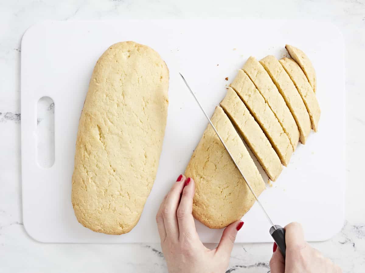 Biscotti being sliced.