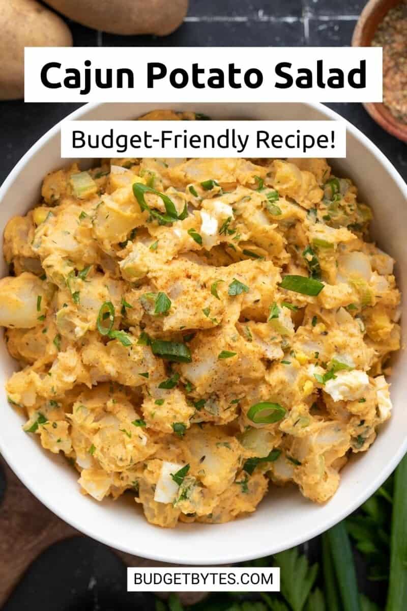 Overhead view of a bowl full of Cajun Potato Salad with title text at the top.