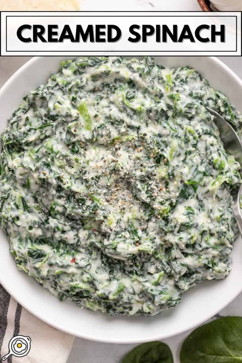 Close up overhead view of creamed spinach in a bowl.