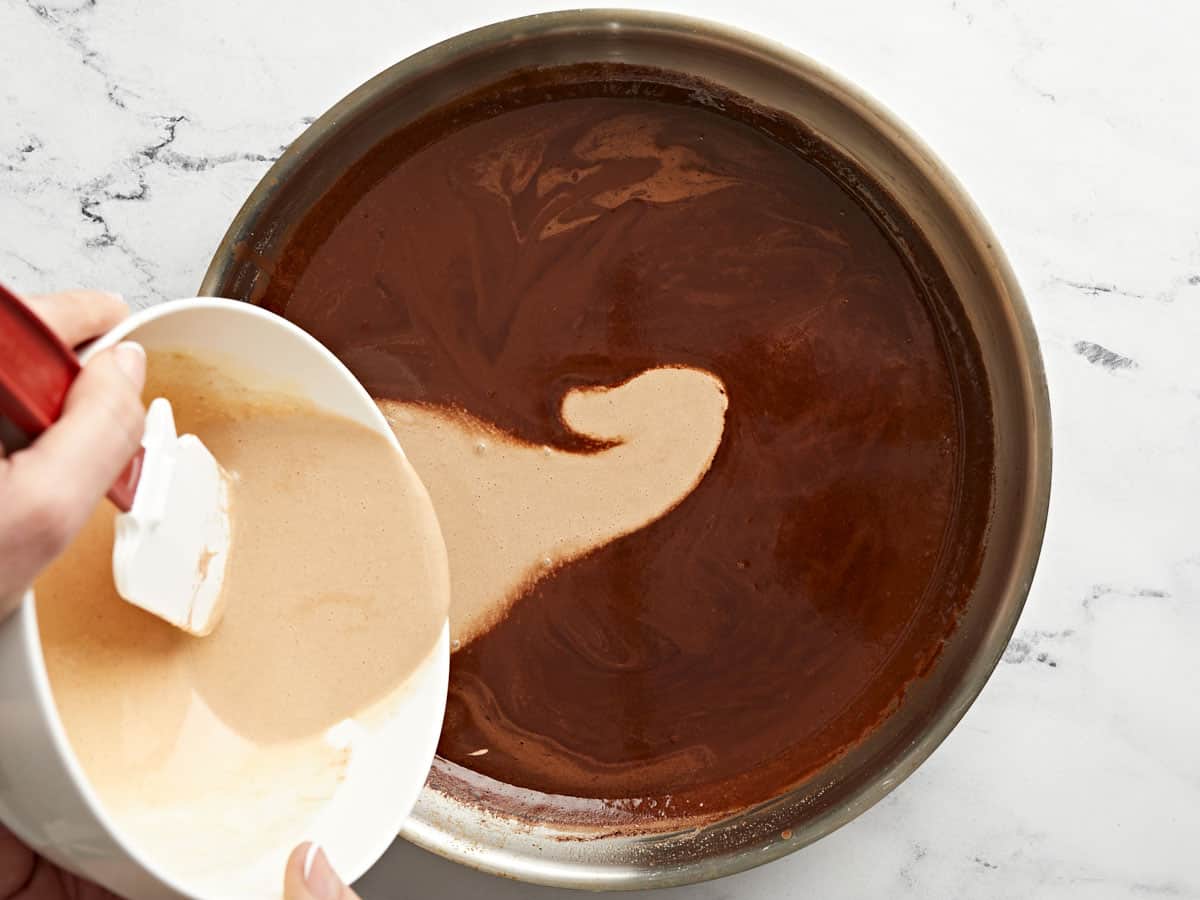 Egg Mixture added to the hot chocolate in the skillet.