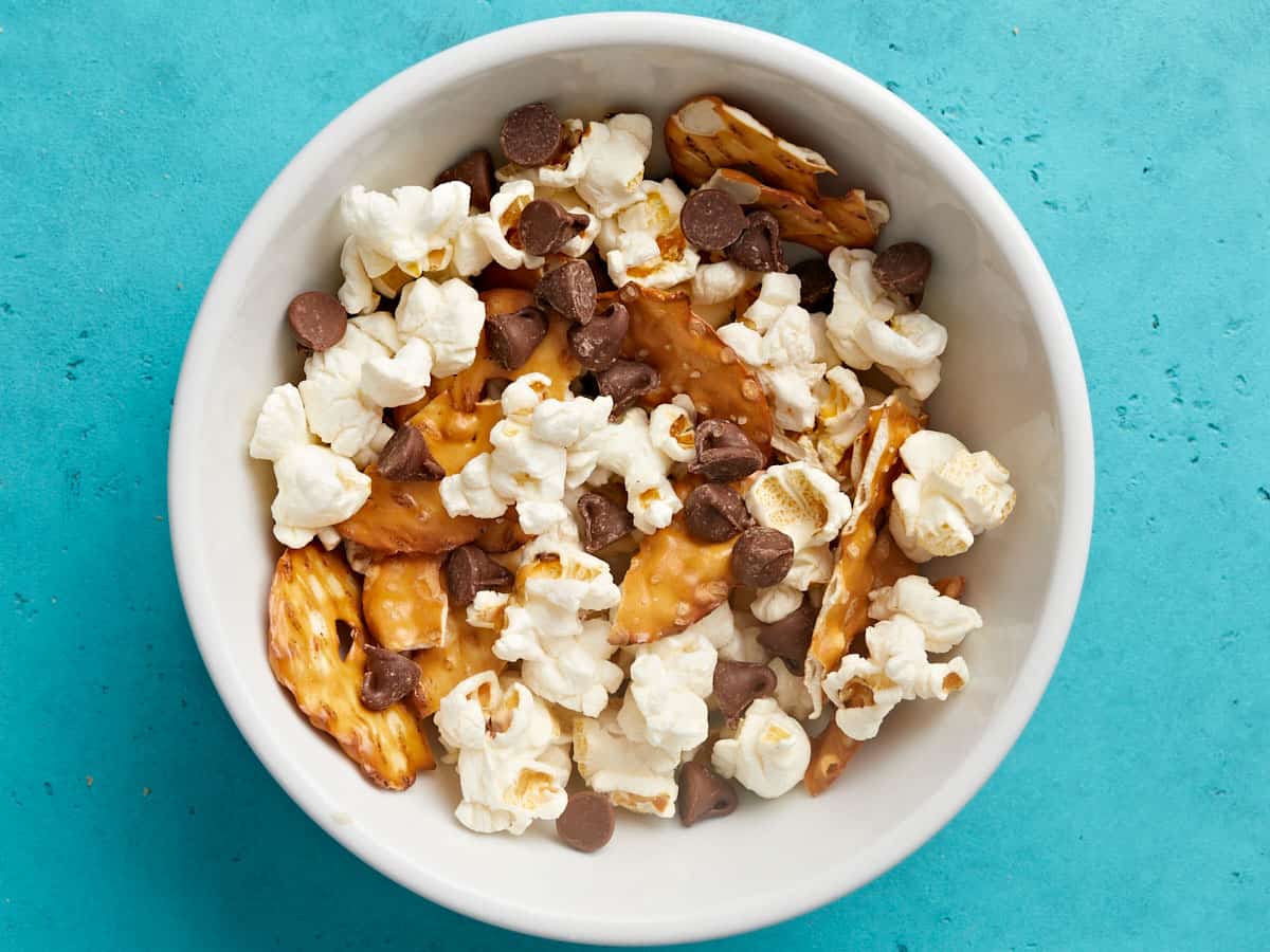 Overhead view of a bowl full of snack trail mix.