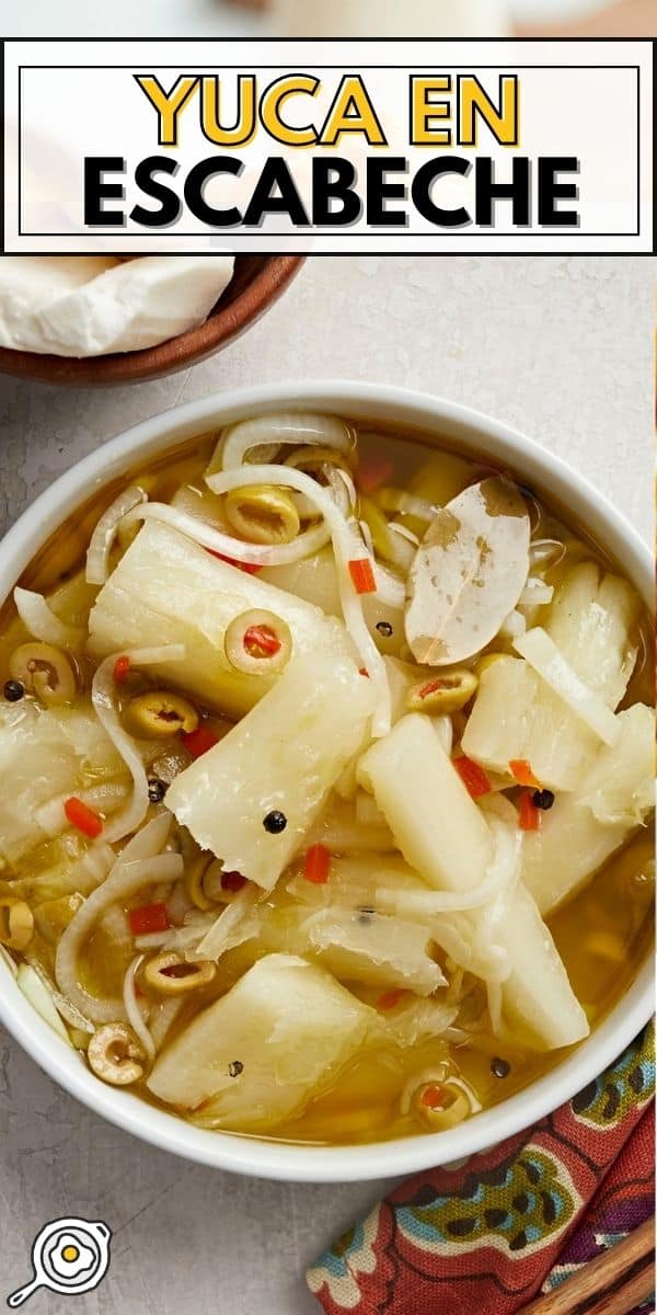 Overhead shot of Yuca En Escabeche in a white bowl.