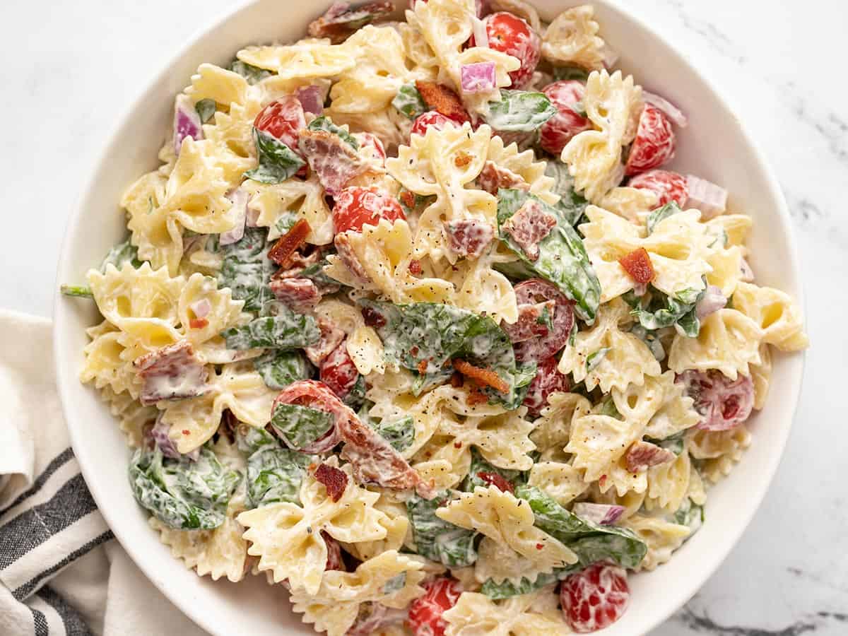 Close up overhead view of BLT pasta salad in a bowl.