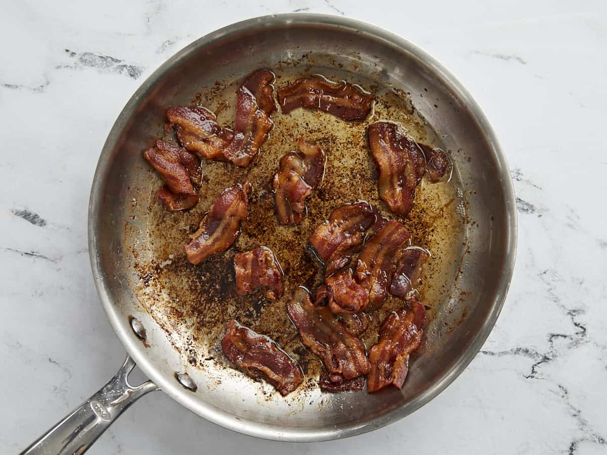 Cooked bacon in a skillet.