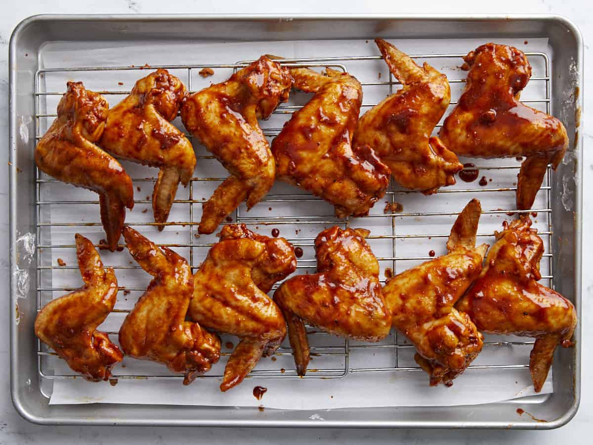 Overhead shot of BBQ Wings after the first bake, brushed with a second round of BBQ sauce.