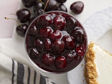 Overhead view of cherry sauce in a glass dish.