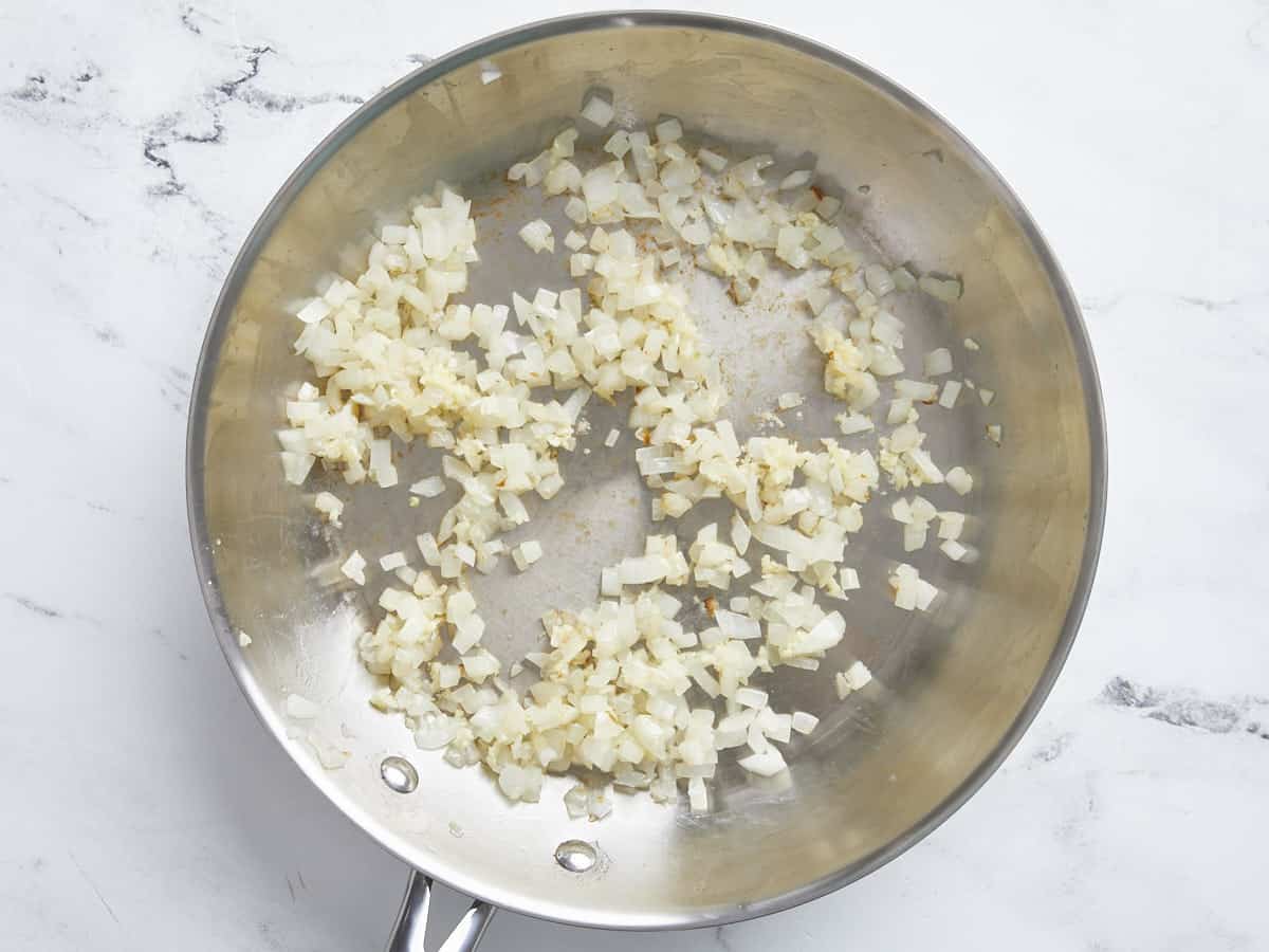 Sautéed onion in a skillet.