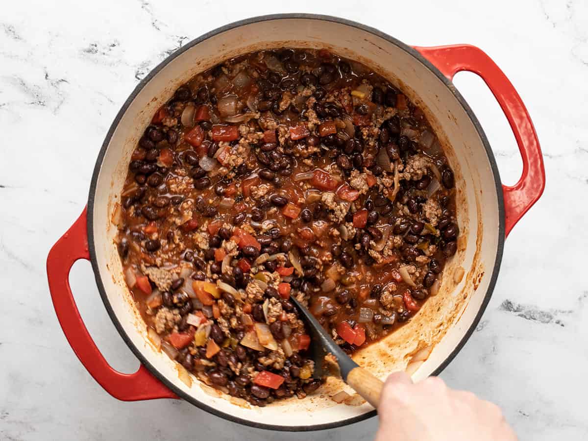 Chili ingredients in the pot, stirred, but not simmered.