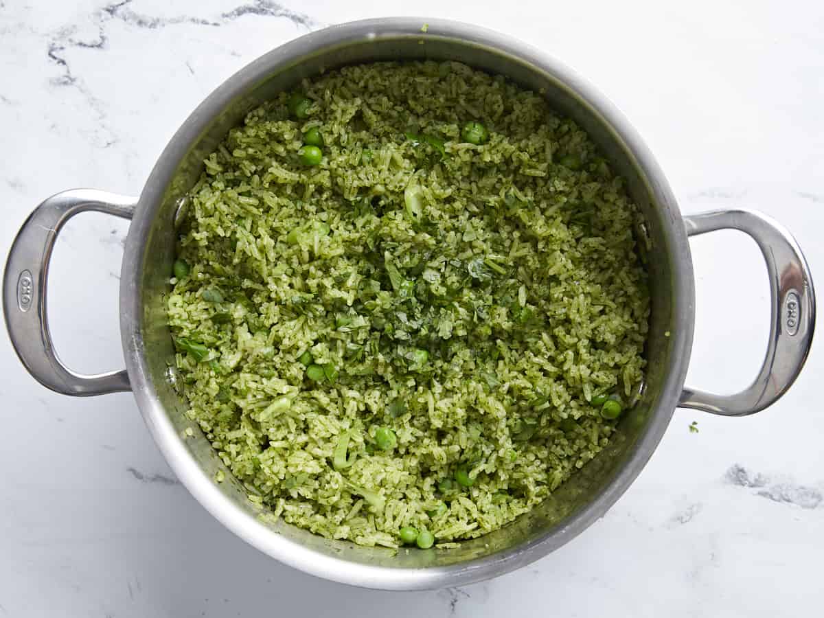 Finished Arroz Verde dish with finely chopped cilantro on top.