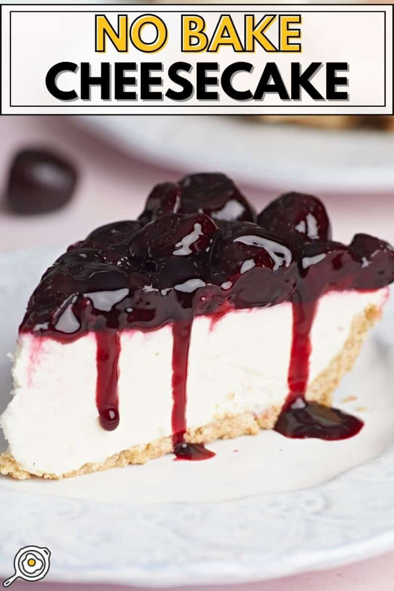 Close up side view of a slice of no-bake cheesecake with cherry topping.