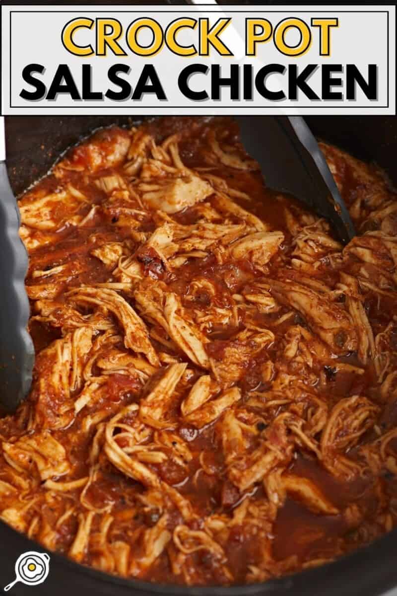 Close up side view of salsa chicken in the crock pot.