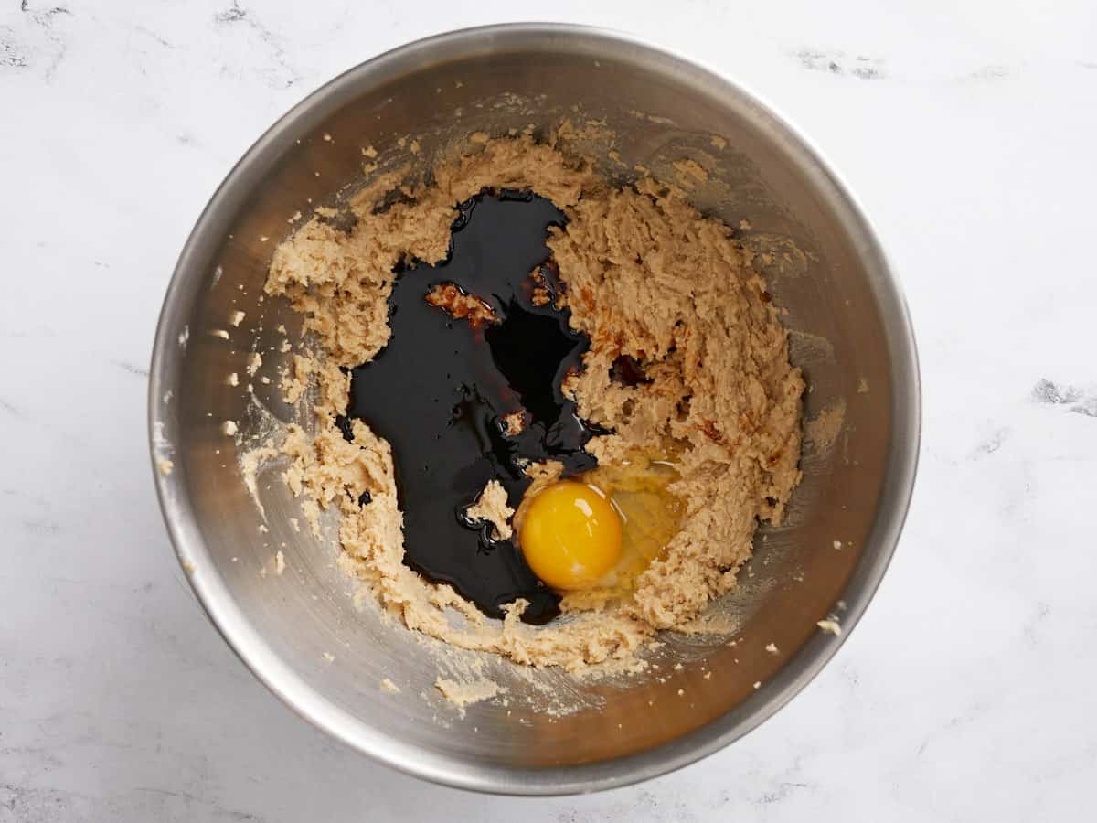 Wet ingredients for gingerbread cookies in a mixing bowl. 