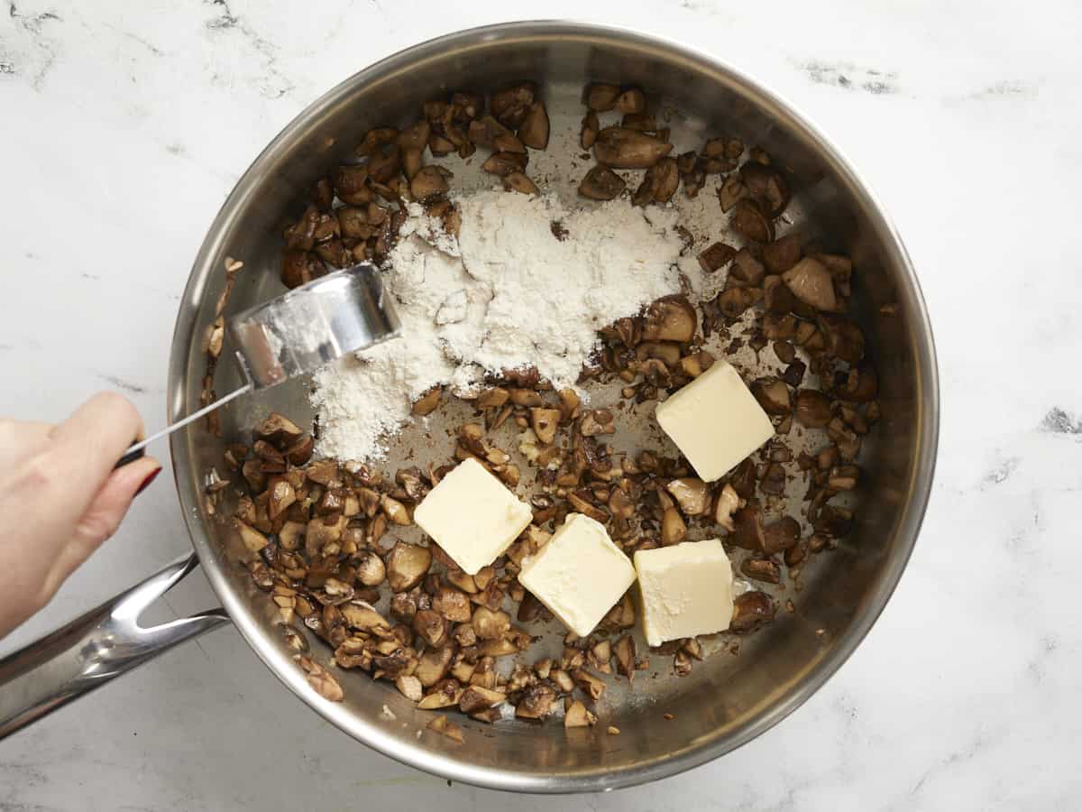 Butter and flour added to the skillet with the mushrooms. 