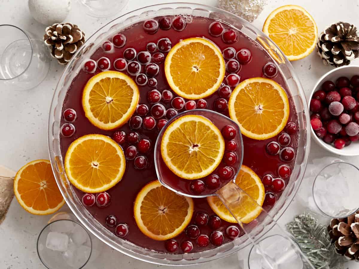 Overhead view of the punch bowl with a ladle lifting a serving. 