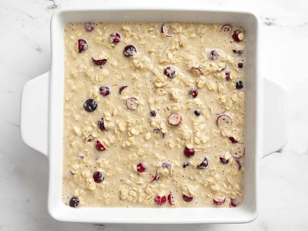 Baked oatmeal mixture in the casserole dish before being baked.