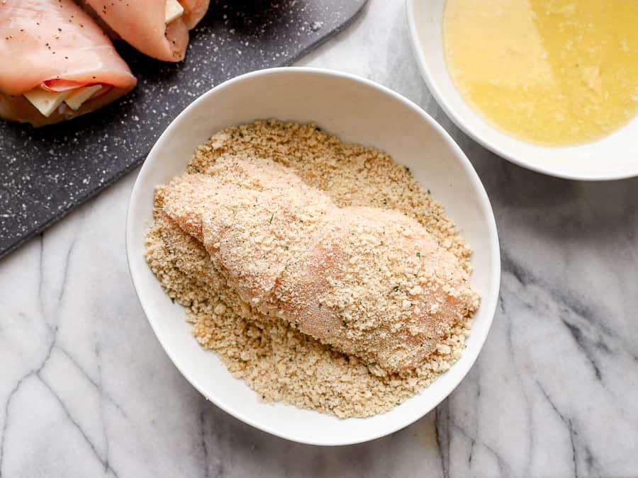 a rolled-up chicken breast dipped in breadcrumbs.