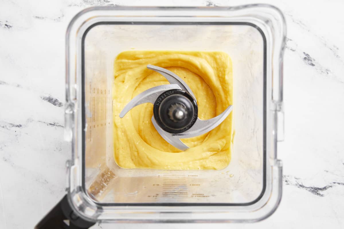 blended mango sorbet in a blender.