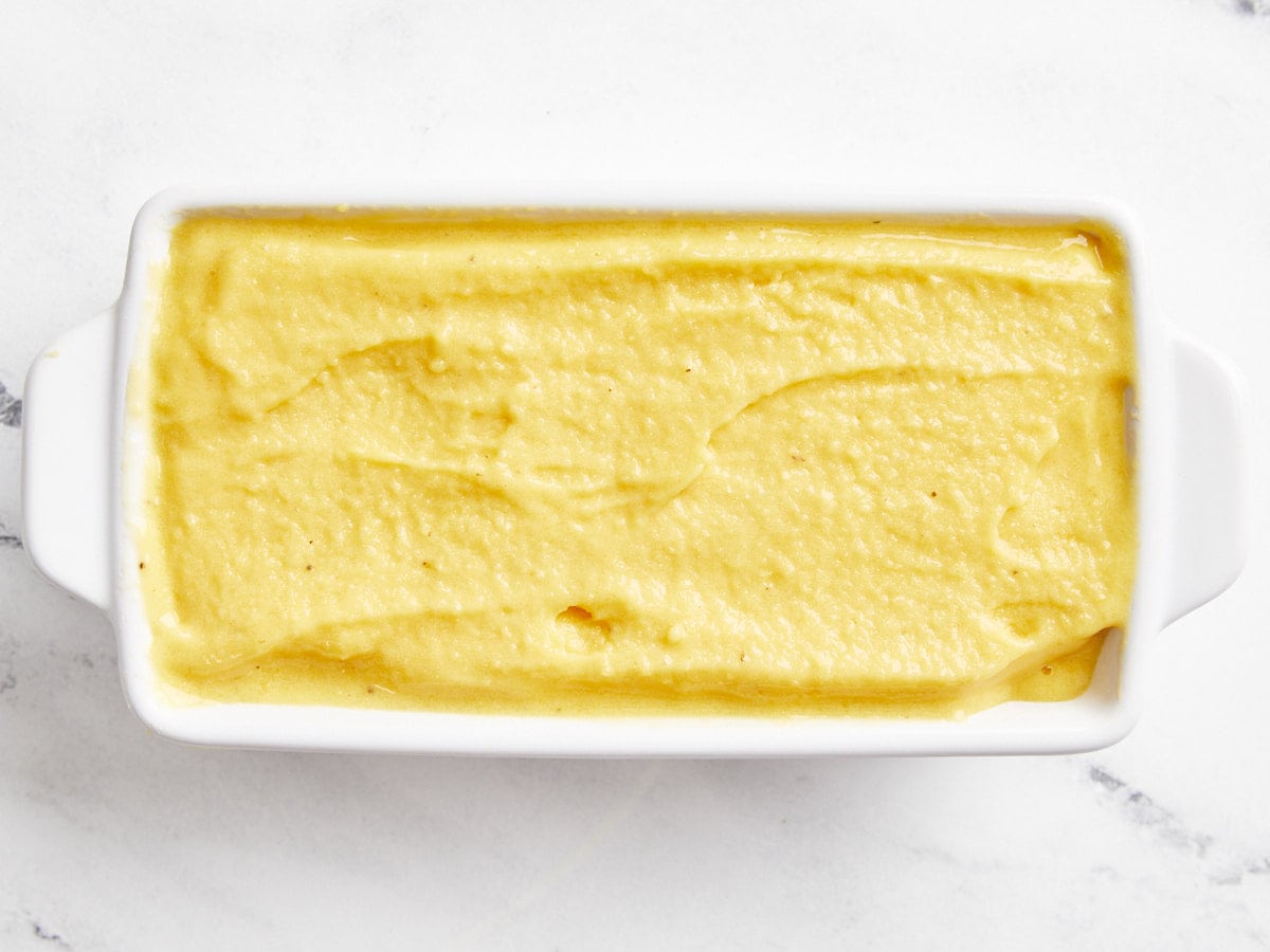 mango sorbet in a white rectangular dish.