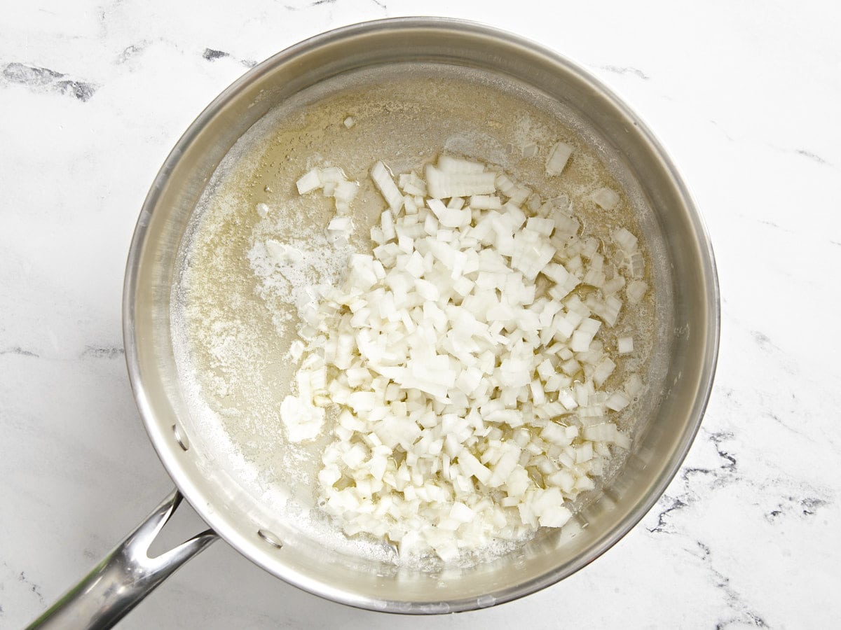 sauteed onions in a pan.