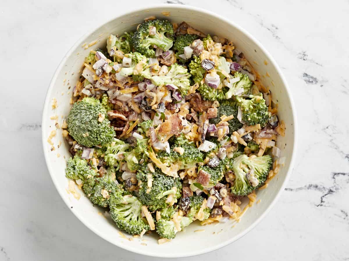 broccoli salad in a white bowl.