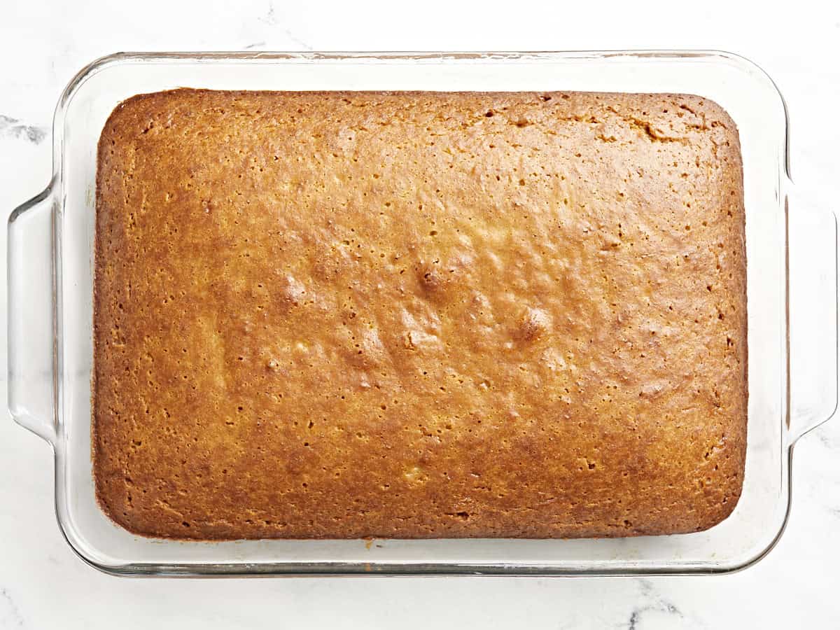 baked banana cake in a glass baking dish.