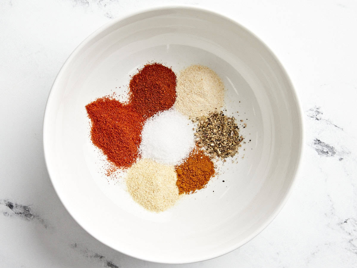 Hamburger seasoning in a small bowl.