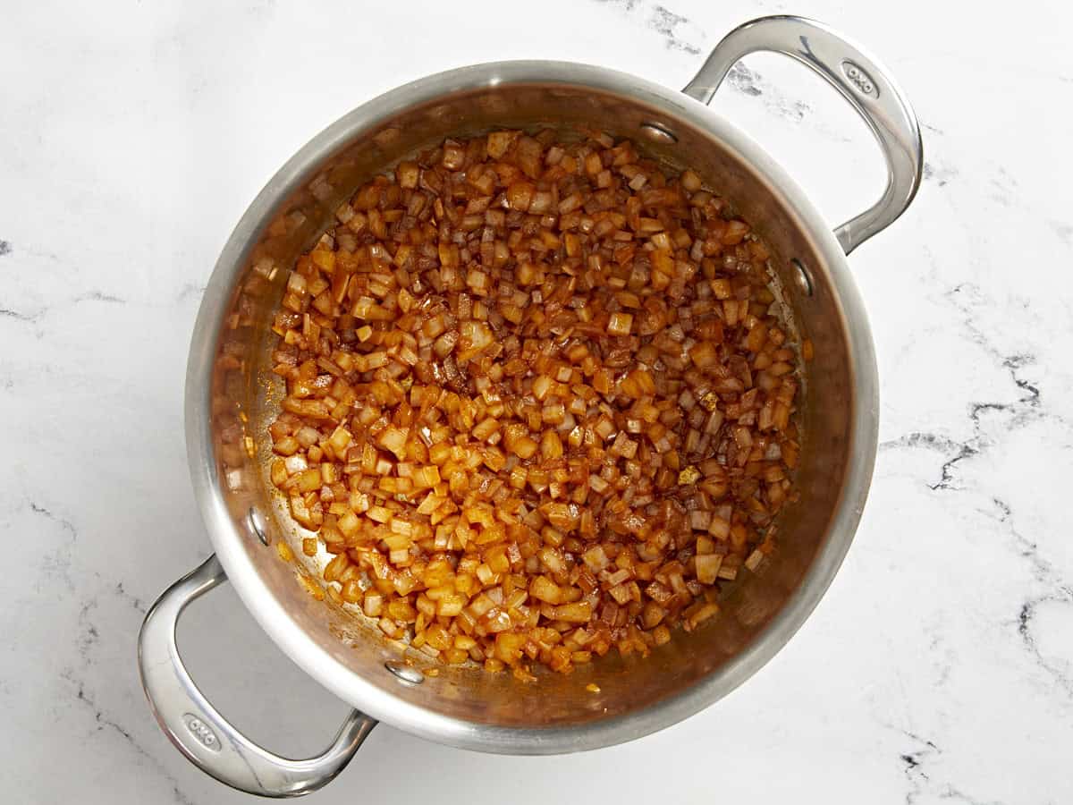 seasoned sautéed onion in a pan.