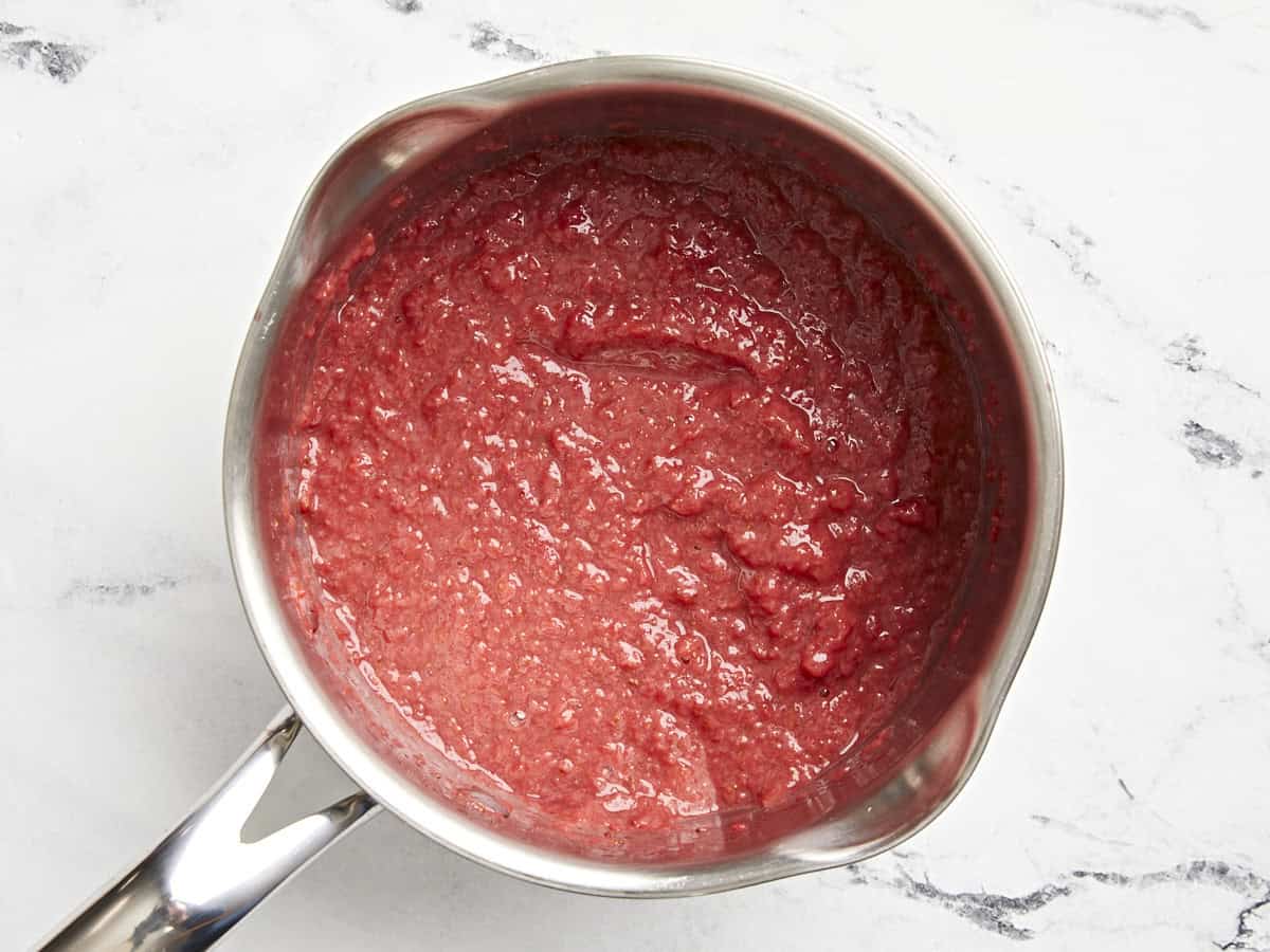 Reduced strawberries in a saucepan.