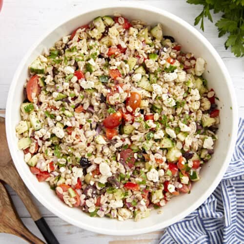 overhead view of barley salad in a bowl.