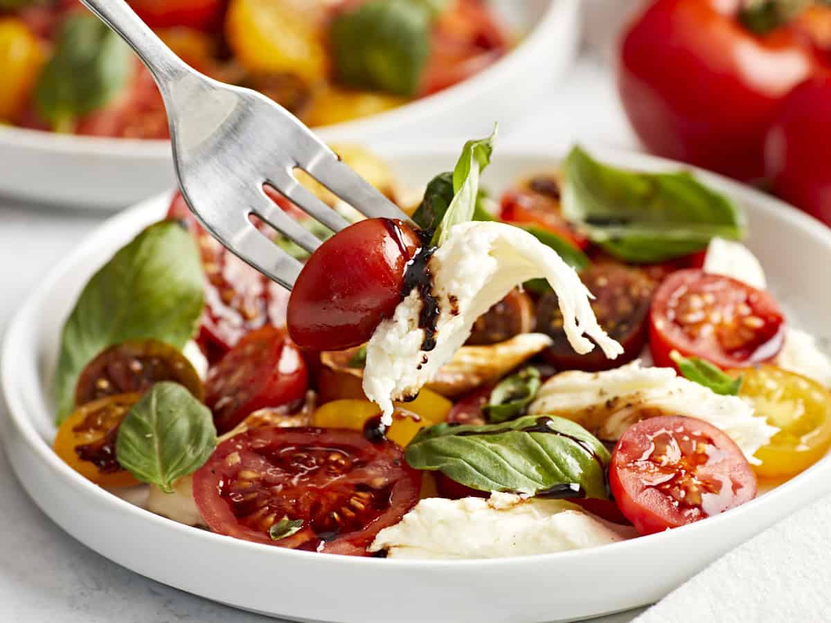 a forkful of caprese salad.